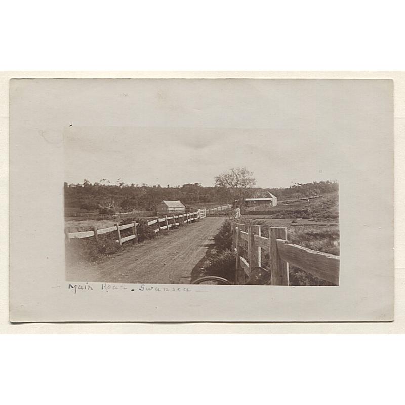 (AT15028) TASMANIA · c.1910: unused real photo card with a view of the MAIN ROAD SWANSEA · photographer not identified · fine condition