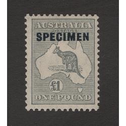(BB15156) AUSTRALIA · 1935: £1 grey Roo (CofA Wmk) with Type D SPECIMEN o/print BW 54x  · clean hinge remnant · tiny light gum "spot" · c.v. AU$80 (2 images)