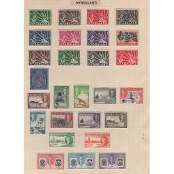 (BB15199L) NYASALAND · 1891/1964: M/U collection on album pages in a mixed condition · from B.C.A. o/prints and includes a fiscally used £1 KGV defin · mainly oddments/mint short sets from KGVI/early QEII era · useful items · 80 stamps (4 images)