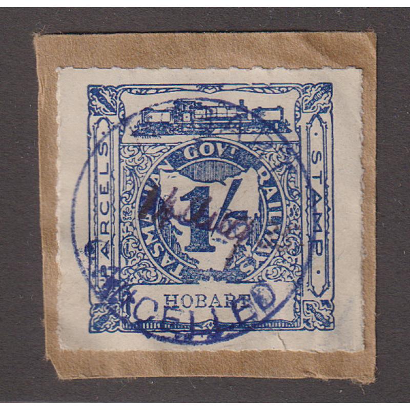 (CN1208) TASMANIA · 1930s: 1/- deep blue Railway Parcel Stamp (3rd Garratt issue) C&I #1343 on parcel piece · small "nick" in lower edge o/wise in excellent condition · full strike of HOBART CANCELLED railways datestamp