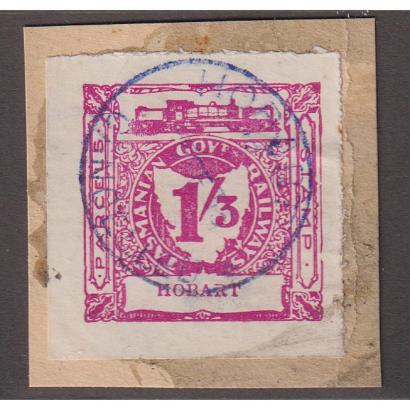 (CN1209) TASMANIA · 1930s: 1/3d- magenta Railway Parcel Stamp (3rd Garratt issue) C&I #13434 on parcel piece · some light soiling at LR o/wise in excellent condition · full strike of HOBART CANCELLED railways datestamp