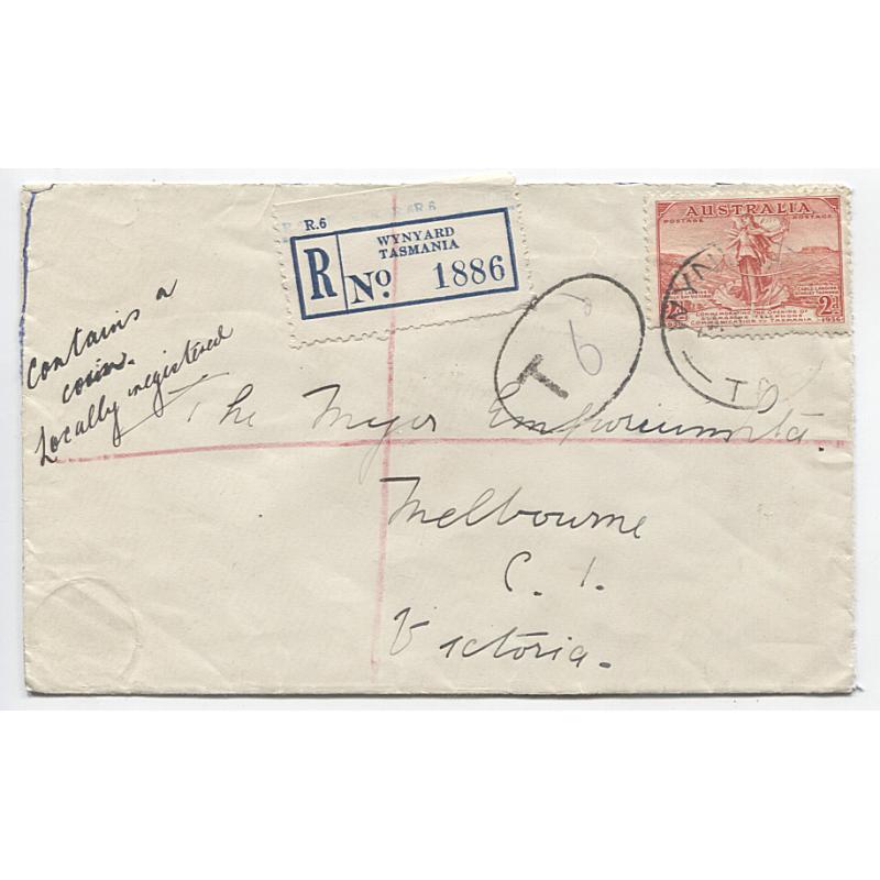 (CN1505) TASMANIA  1936: cover to commercial Melbourne address mailed at Wynyard · endorsed "contains a coin (you can see the impression) · Locally registered" · taxed double the fee · opened on 3 sides o/wise in fine condition