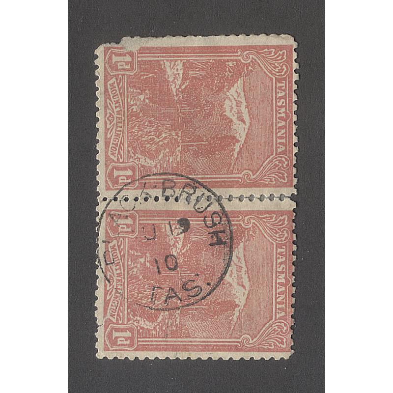 (DA15012) TASMANIA  · 1910: an unusually clear and nearly complete example of the BLACK BRUSH Type 1a on a pair of 1d Pictorial pair (faulty corner) · postmark is rated RR+(12*)