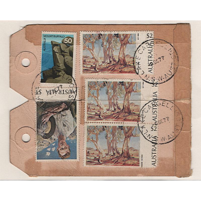 (GG15211) AUSTRALIA · 1977: joined parcel tags with defins to $2 affixed making up a rate of $7 which would have paid reg fee + intra-state air mail parcel for up to 1kg · some wear but very presentable