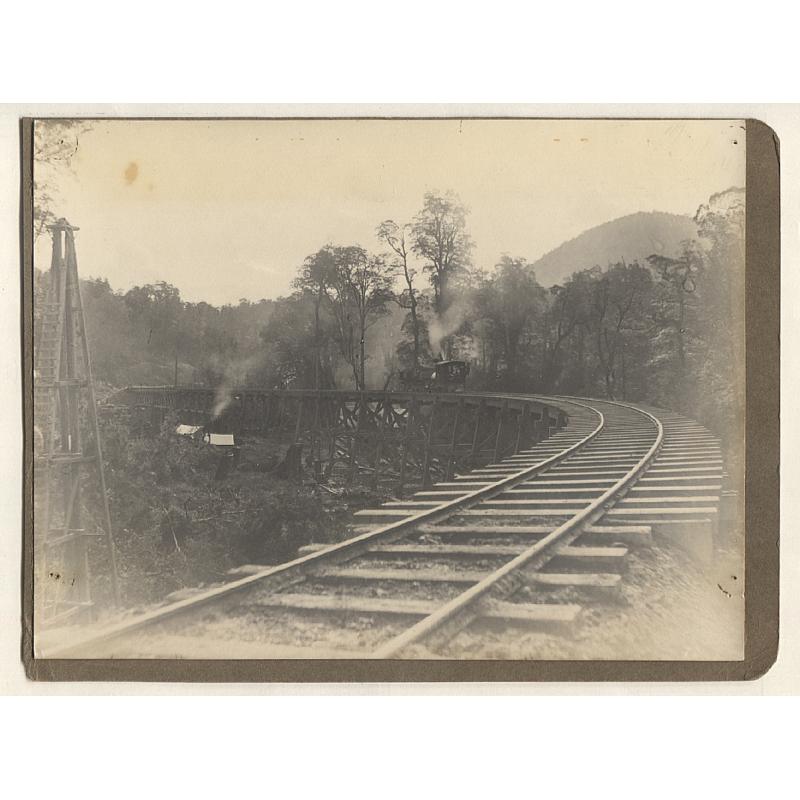 (PG10019L) TASMANIA · 1897: large photograph of QUARTER MILE BRIDE on the MT LYELL RAILWAY during the construction period mounted to a cut-out cardboard album page