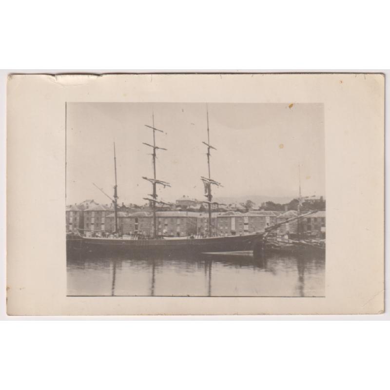 (PT1010)  TASMANIA · c.1905: unused real photo card w/view of the Barque Harriet McGregor docked at New Wharf, Hobart · see full description
