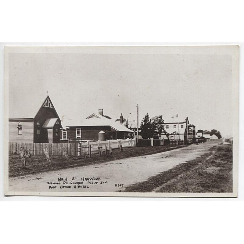 (PT1103)  NEW SOUTH WALES · c.1910: real photo card w/view of "MAIN ST HARWOOD (ISLAND) SHEWING R.C. CHURCH, POLICE STN POST OFFICE & HOTEL" · postally used from there to Tasmania · fine condition