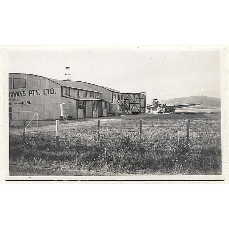 (SS15012) TASMANIA · 1939: dated photograph showing an Australian National Airways DC-2 aircraft loading passengers outside the former Holyman's Airways hanger at CAMBRIDGE aerodrome · fine condition
