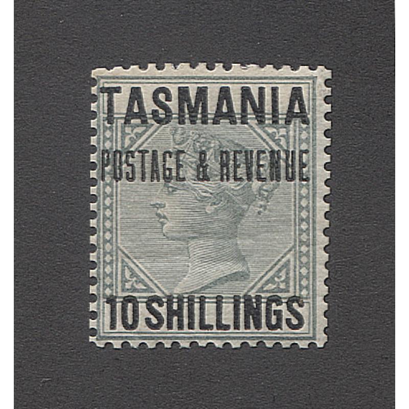 (TY10037) TASMANIA · 1886: De La Rue essay comprising Crown Colony Key Plate in green optd TASMANIA  POSTAGE & REVENUE · TEN SHILLINGS  in black · some hinge remnants on back o/wise in fine condition (2 images)