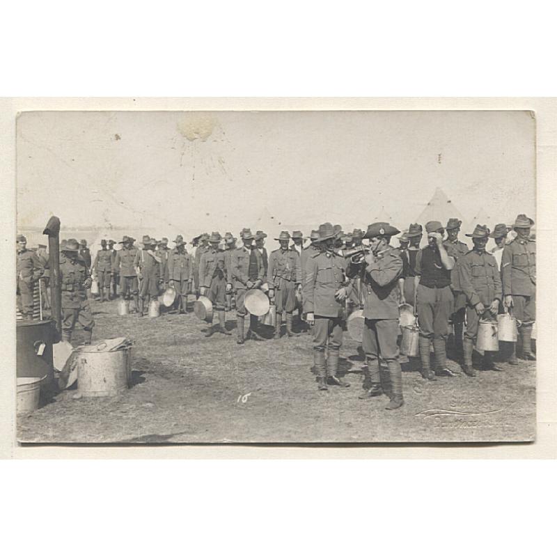 (TY10049) TASMANIA · c.1912: real photo card showing soldiers queuing for hot water at the annual Easter MILITARY CAMP held near ROSS · postally used from the town · see full description