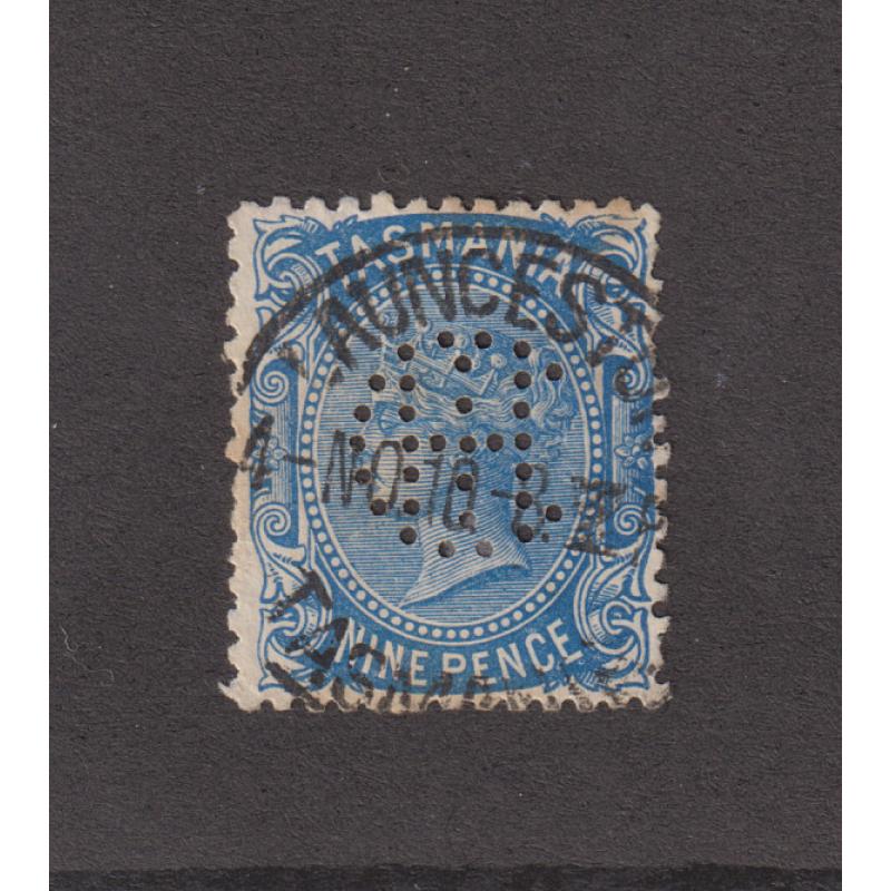 (TY1093) TASMANIA · 1910: a used 9d blue QV S/face (Crown/A wmk · perf.12½) SG 256 bearing an IHC (International Harvester Company) private perf · clear Launceston pmk · some minor imperfections but I have never seen another example!