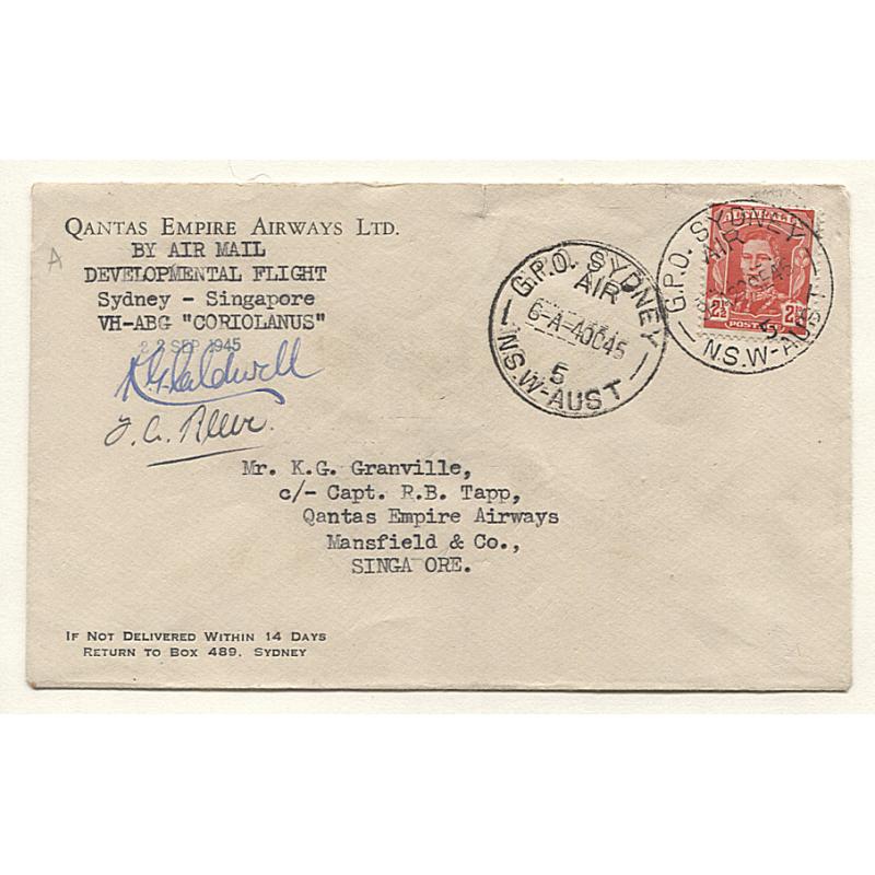 (TY15109) AUSTRALIA · 1945 (Oct 4th): QANTAS EMPIRE AIRWAYS envelope carried Sydney to Singapore on "AIR MAIL DEVELOPMENTAL FLIGHT" AAMC #1009 · arrival b/stamp · signed by Captain and First Officer · excellent condition · c.v. AU$200