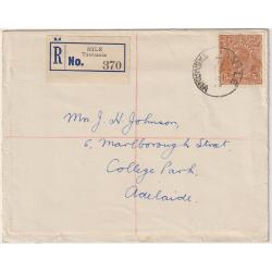 (UU1236) TASMANIA · 1937: registered cover to Adelaide mailed at NILE with blue/black reg. label · array of b/stamps 'document' the journey · excellent condition (2 images)