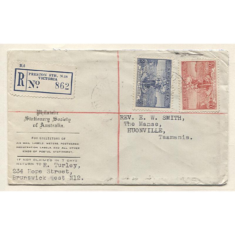 (VV10024) AUSTRALIA · 1936: registered Postal Stationery Society of Australia envelope mailed to Tasmania with the Bass Strait Cable duo making up the correct rate  · excellent condition with a range of b/stamps (2 images)