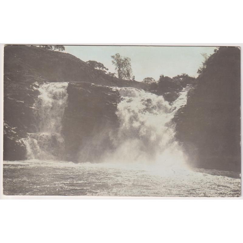 (VV1054) TASMANIA ·  c.1910: unused lightly colour-tinted real photo view of a flood passing over the FALLS OF CLYDE near BOTHWELL · fine condition and a very scarce view indeed!