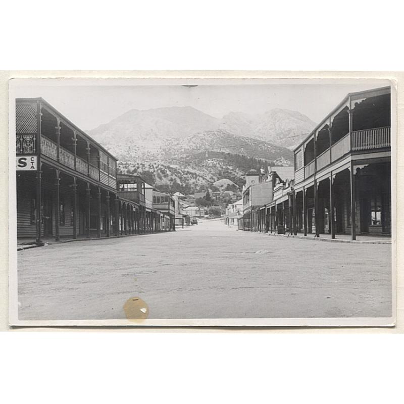 (VV15029) TASMANIA · 1930s: unused real photo card w/view of a nearly deserted ORR STREET QUEENSTOWN · photo-chemical stain and minor scuff on front o/wise in excellent condition