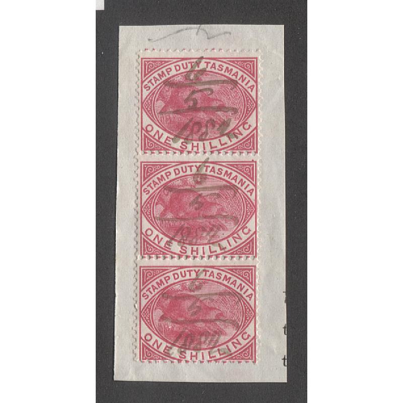 (VV15053) TASMANIA · 1880: fiscally used vertical strip of 1/- pink Platypus postal/fiscal Craig 7.40 · pen-cancelled · affixed to a clean document piece · fine condition