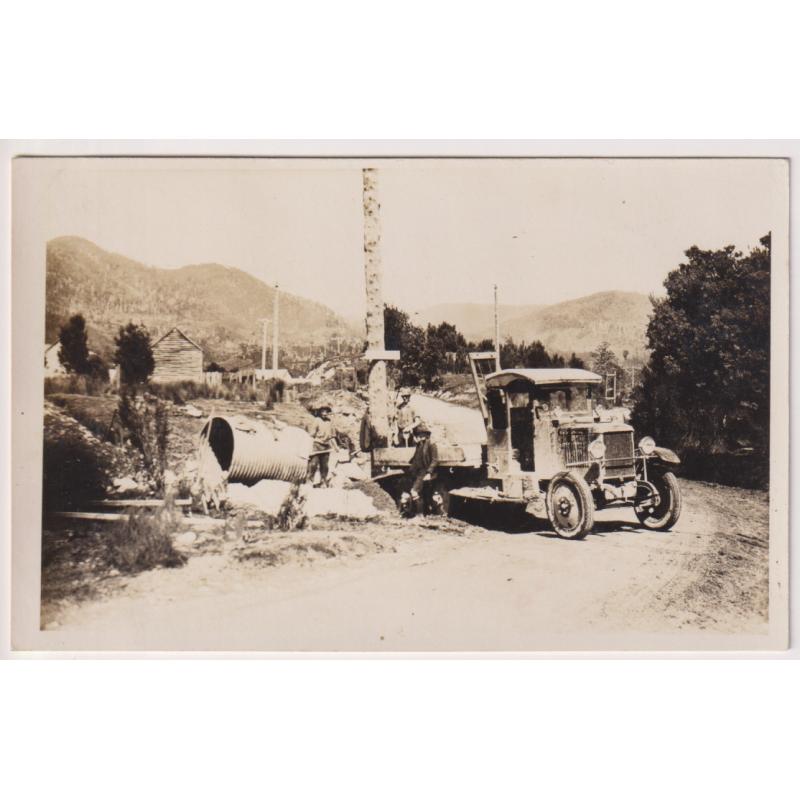 (WS1119) TASMANIA  · 1920s: real photo card with a view of a small construction site at ROSEBERY · Electrolytic Zinc Company h/s on verso indicates that they may have been the publisher · see full description (2 images)