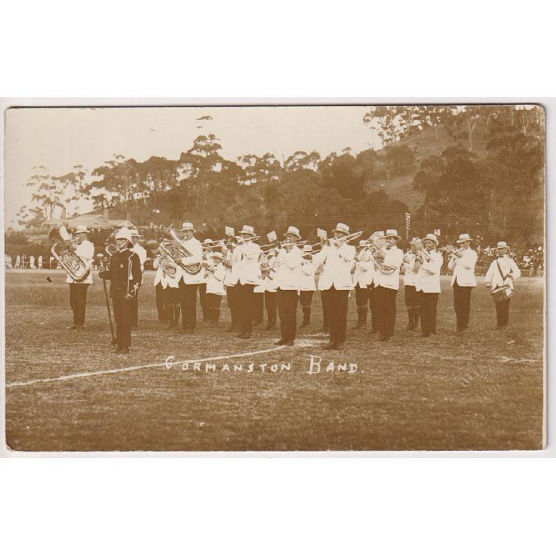 (WS1163) TASMANIA  ·  c.1920: unused real photo card by Rutter's Studio with a portrait of the GORMANSTON BAND "in action" at West Park, Burnie · excellent condition