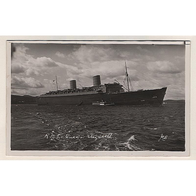 (WW15111) TASMANIA · 1942: unused real photo card by J.C. Breaden (with postcard back!!) w/view of troopship RMS "Queen Elizabeth" during a visit to Hobart  · fine condition