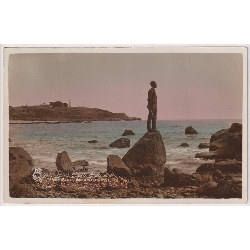 (WW1521) TASMANIA  · 1910: colour tinted real photo card by Phoenix (NSW) with a view of MERSEY BLUFF, NORTH WEST COAST · postally used with 1d Pictorial franking · fine condition