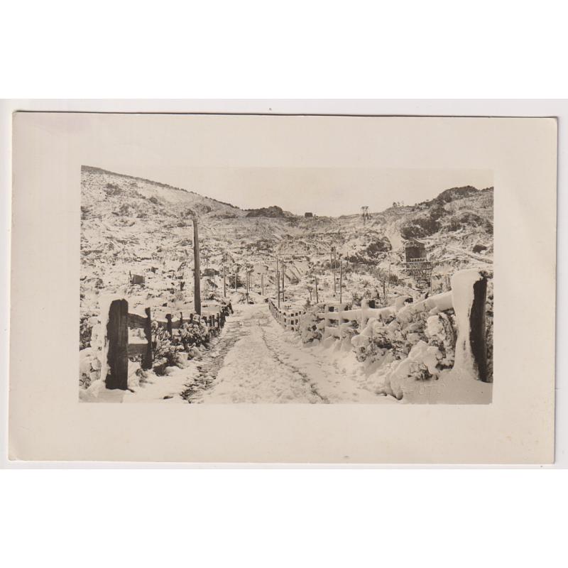 (WW1531) TASMANIA  · c.1920: real photo by Robinson w/view of a SNOWFALL at MOUNT BISCHOFF (Waratah) · greeting on verso but not postally used