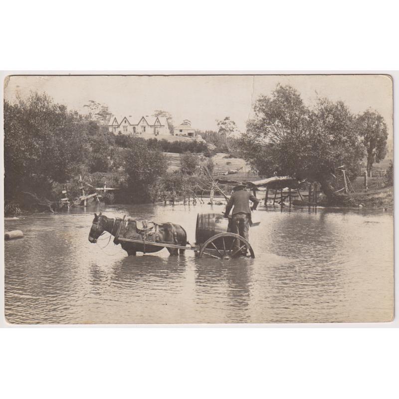 (WW1573) TASMANIA · 1907: real photo card featuring a man fetching drinking water · postally used from Hamilton so it can be assumed that the view was taken on the Clyde River which flows through the town · excellent condition