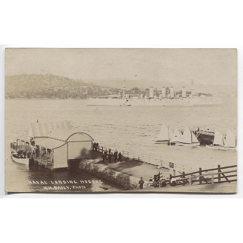 (YY1081) TASMANIA · 1907: real photo card by H.H. Baily with a view of the NAVAL LANDING HOBART during the annual regatta · postally used to a musician on the H.M.S. "Powerful" which is featured in the photograph