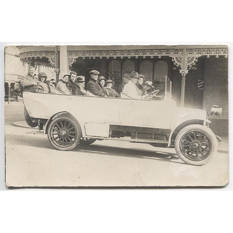 (YY1091) TASMANIA · c.1920: real photo card by H. Dowie & Co. with a portrait of excursioners ready to depart on a sight-seeing journey from the Tourist Bureau, Hobart · some writing and light soiling on the back but overall condition is excellent