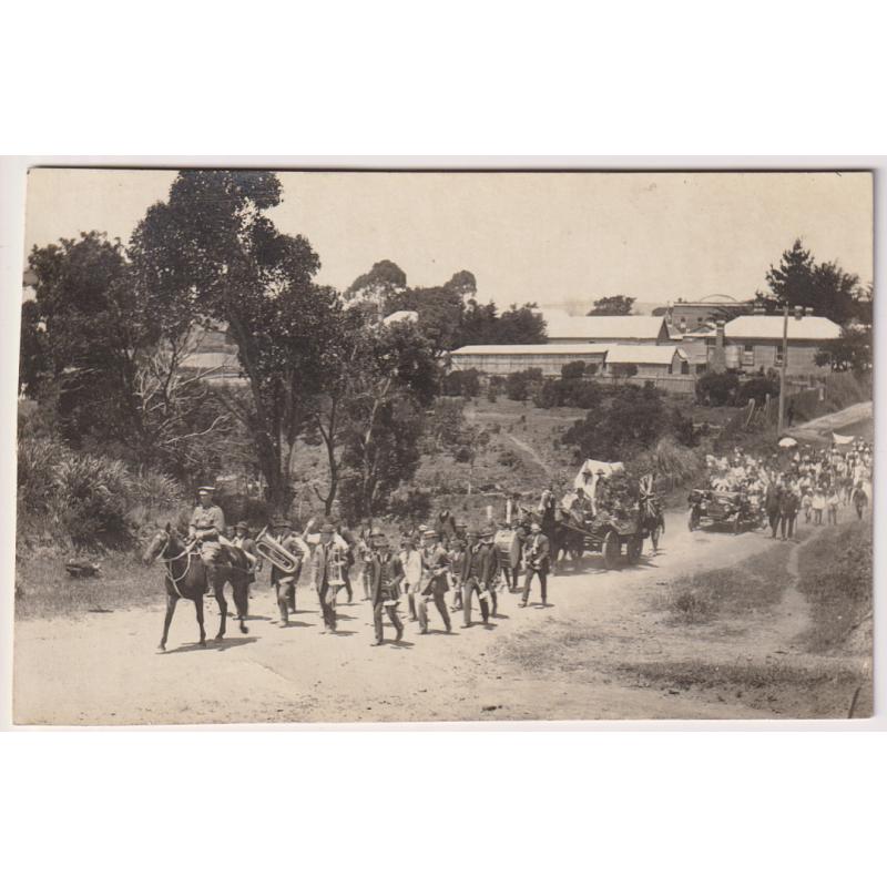 (YY1213) TASMANIA · c.1915: postcard size photo by Sargent's Studio with a view of a PATRIOTIC PARADE at Wynyard · note Boy Scouts in a tent following the band! · see full description